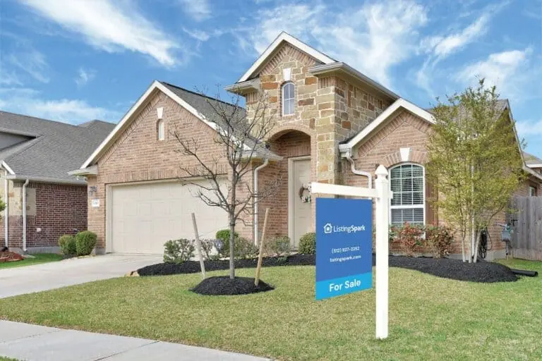 A ListingSpark yard sign in front of a Texas home